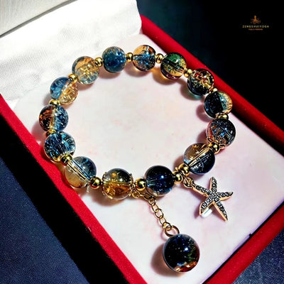 bracelet femme en perle eclat bleu pendentif etoile